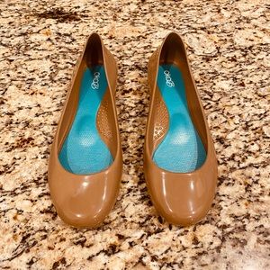 Brand new in box. Oka-B nude rain flats. Size 7